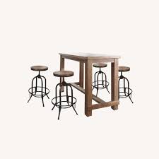 Stylish bar stools provide a sense of authenticity and comfort to your home bar or kitchen counter experience. Ashley Furniture Dining Room Bar Table And Bar Stools 4 Aptdeco