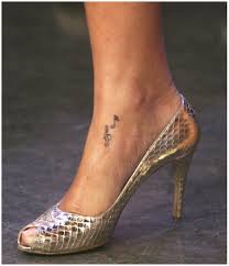 Falling stars temporary tattoo like rihanna 4 strips with stars in different shapes and sizes in approximately 11 x 3,1 cm. Rihanna S Tattoos Rihanna Wiki Fandom