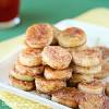 Grease or line a muffin pan with paper liners and fill the muffin cups ¾ the way full. 3