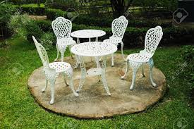 Chairs and table in the garden. Wrought Iron Table And Chairs In Garden Stock Photo Picture And Royalty Free Image Image 34697270