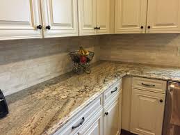 My New Kitchen Typhoon Bordeaux Granite With Travertine Tile Backsplash And White Trendy Kitchen Backsplash Kitchen Renovation Cream Colored Kitchen Cabinets
