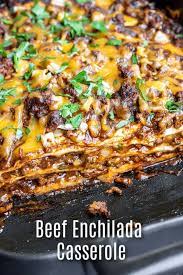 This Easy Cheesy Beef Enchilada Casserole Is Layered With Seasoned Ground Beef Onions Chees Enchilada Casserole Beef Beef Enchiladas Beef Casserole Recipes