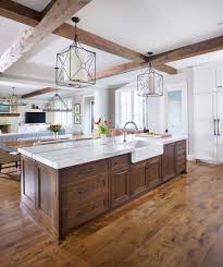 Galvanized bucket storage is perfect underneath. 130 Rustic Kitchen Islands Ideas In 2021 Rustic Kitchen Rustic Kitchen Island Kitchen Remodel