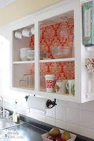 Then You Can Line Your Doorless Cabinets With Fabric For A Gorgeous Focal Point Open Kitchen Cabinets Kitchen Cabinet Remodel Rental Kitchen