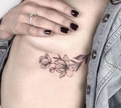 If you opt for the small rose and stem, the sternum or along the collar bone is the best placement, while a bunch of rose heads will look best on the upper chest. Under Boob Tattoo Guide Top 15 Queries Answered 2021