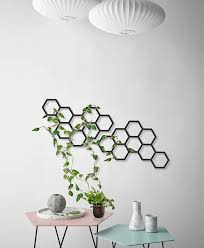 Metal wall art offers an excellent way of decorating a room. Modern Modular Trellis Can Be Hang In Different Combinations You Can Hang One Or More As You Like Geometric Wall Decor Metal Wall Planters Geometric Planter