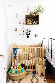 Forging Their Own History In A Contemporary Space Baby Nursery Storage Small Space Nursery Parents Room