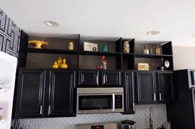 Our cabinets are all wood with three coats of finish inside and out! Kitchen Cabinet Uppers Shelf Topper Flipping The Flip