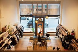 3 Companies Incorporate Solitaire Pendant In Modern Retail Lighting Display Niche Modern Retail Lighting Store Design Interior