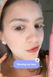 shaving my face for a smooth makeup application— with the viral hair  identifier spray that comes in a kit with serveral razrs this is an aerosol  of white spray that shows every little hair
