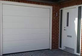 With this type of door, you can park directly in front of the garage without worrying about the door hitting your vehicle when it's being opened. Measuring Sectional Garage Doors Sizing Guide In Between Inside Garage Openings Sectional Doors Uk