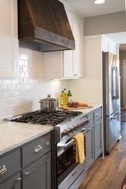 Kitchen With Dark Wood Vent Hood Kitchen Range Hood Fixer Upper Kitchen Kitchen Hoods