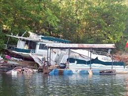 sinking houseboats causing commotion on