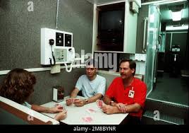 Patty Boll of the U.S. Air Force School of Aerospace Medicine, left, MAJ  James Rundell of the Uniformed Services University of the Health Sciences,  center, and James McIntee of Rockwell International play