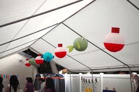 I attached it to some ribbon and taped it on to his high chair. Kara S Party Ideas Colorful Gone Fishing Birthday Party Kara S Party Ideas