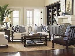 The centre of the room is characterized by three antique trunks, a rustic bench, a green sofa, and a dark armchair. Free Download British Colonial Dcor Tommy Bahama Living Room Redo Pinterest 736x552 For Your Desktop Mobile Tablet Explore 49 British Colonial Wallpaper Colonial Williamsburg Wallpaper Reproductions Reproduction Period Wallpaper