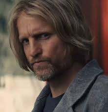 Katniss and Peeta joke at Haymitch's expense