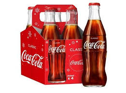 Bottle with adhered printed label. Coca Cola Launches Limited Edition Father Christmas Packs News The Grocer