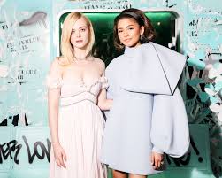 Tiffany Co 2018 Spring Campaign Believe In Dreams Zendaya And Elle Fanning At Tiffany Co Paper Flowers Event And Believe In Dreams Campaign Launch In Nyc Elle Fanning Zendaya Bridesmaid Dresses
