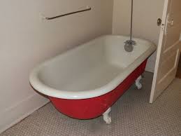I would either replace the old tub with a nice and big acrylic version, they can sit flat on the floor with. Repair A Peeling Tub Terry S Plumbing