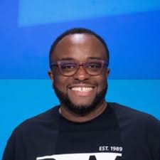 Chris Ellett from ReliaQuest and I, sporting our Mind Over Cyber #Ally arm  bands!