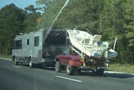 motorhome towing a truck boat trailer what could go wrong motorhome towing a truck boat trailer