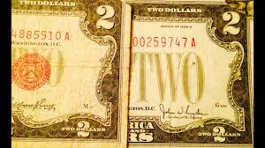 two dollar bills worth money look for red seal 1928 series e star note