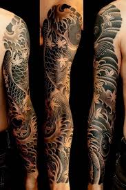 Black And Gray Traditional Tattoo Sleeve 1001 Traditional Tattoo Ideas Information About Their History And Symbolism Old School Tattoo I In 2020 Best Sleeve Tattoos Arm Sleeve Tattoos Koi Tattoo Sleeve