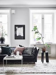 Charming furniture to decorate living room with black leather sofa also white table. Enhance Your Living Room Decor With Outstanding Black Leather Sofas Paris Design Agenda