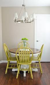 Lime Painted Wooden Kitchen Chairs With Round Table With White Legs And Dark Wood Top In A Room With Laminate Oak Table And Chairs Furniture Furniture Makeover
