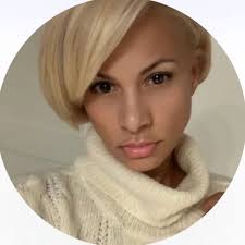 In 1962, Marilyn Monroe wore Jean Louis's custom, crystal-studded “nude”  gown to serenade President Kennedy. Stitched to her body and adorned with  over 2,500 crystals, it became an iconic fashion moment. The