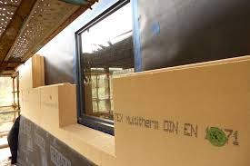Started Fixing Wood Fibre Blocks Of Insulation To Exterior Of Our Passivhaus They Fit Together Like A Jigsaw Fiber Insulation Timber Frame Passive House
