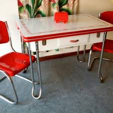 Traditional vintage retro table and chair sets typically boast a rustic appearance, with solid construction and a simplistic design. Loving This Red And White Kitchen Table Set Retro Kitchen Tables Vintage Kitchen Table Kitchen Table Settings