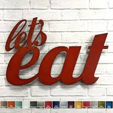 Find wood and metal wall decor for every color scheme and style, whether you're searching for a clock that doubles as art or a mirror to visually expand a room. Let S Eat Sign Metal Wall Art Home Decor Handmade In The Usa Cho Functional Sculpture Llc
