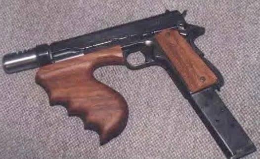 I know it looks funny and cursed but it's actually a real oldie thing. This is the full auto 1911 made by Hyman Lebman who was a gunsmith in San Antonio, Texas.
