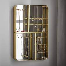 Wall mount jewelry organizer necklace holder and earring display. Brass Framed Mirrored Wall Mount Jewelry Organizer