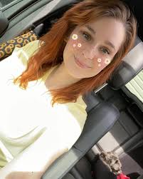 Sunny day, finally 🌻☀️ #sunflower #sunnyday #redhead #dog #schnauzer