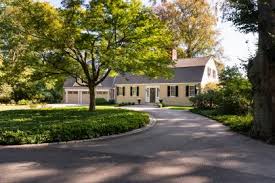 This long driveway in franklin, mass is constructed of crushed bank gravel that has been compacted as if asphalt would have been. Driveway Entrance Landscaping Ideas Hgtv