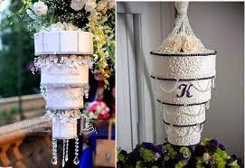 It was a focal point of the space, thanks to a large installation of greenery up above. Chandelier Wedding Cakes Cake Geek Magazine