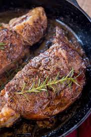 Perfect Easy Ribeye Steak That Is Butter Basted In A Cast Iron Skillet In The Oven With Rosemary Steak Dinner Recipes Easy Steak Recipes Ribeye Steak Recipes