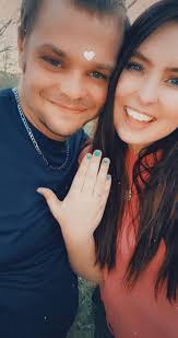 6.0mm Lab-Created White Sapphire and 1/10 CT. T.W. Diamond Frame Engagement  Ring in 10K White Gold