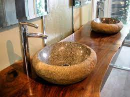 Paired well with the onyx colored wood, the two create simple vanity with white rectangular vessel sink. Vessel Sinks Hgtv