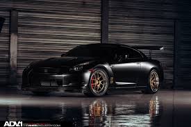 Black And Bronze Wheels Status Is Everything Stanced Black Nissan Gt R On Matte Bronze Adv1 Wheels Nissan Gtr Nissan Gt R Nissan