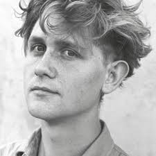 A condettiere is helped into his armour. The armour is based