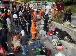 Two men were injured in a road accident involving a bus and a trailer truck at km35.1 of the karak highway Two Tourists Killed 24 Others Injured In Tour Bus Accident