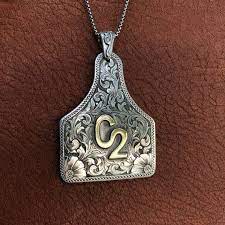 Heres A Really Fun Accessory For The Cowgirl In Your Life A Handmade Hand Engraved Sterling Silver Pendant In The Shape Of A Cattle Ear Tag Need In 2019