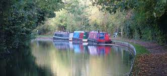 Is that river is (poker) to improve one's hand to beat another player on the final card in a poker game while canal is to dig an artificial waterway in or to. Where To Moor On The Canal Union Wharf Market Harborough