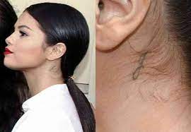 Pictures Of Every Tattoo We Can Find On Selena Gomez S Body Plus The Meaning Inspiration Behind Each Selena Gomez Tattoo Behind Ear Tattoo J Tattoo