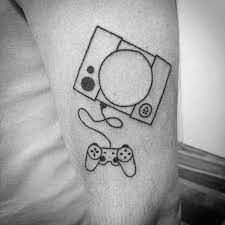 50 Playstation Tattoo Designs For Men Video Game Ink Ideas Playstation Tattoo Gaming Tattoo Tattoo Playstation