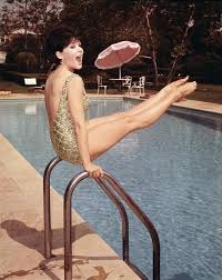 She got up and went to the table to measure herself by it , and found that , as nearly as she could guess , she was however , she soon made out that she was in the pool of tears which she had wept when she was nine feet high. Yvonne Craig 1937 2015 Pop Culture Maven